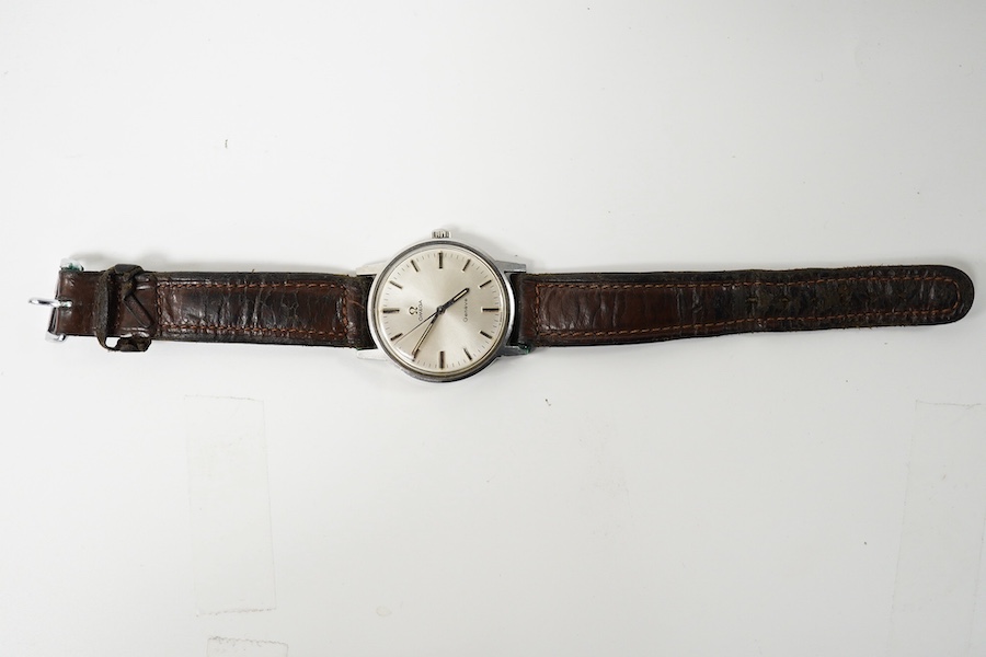 A gentleman's early 1970's stainless steel Omega manual wind wrist watch, on an associated leather strap, case diameter 35mm. Condition - poor to fair